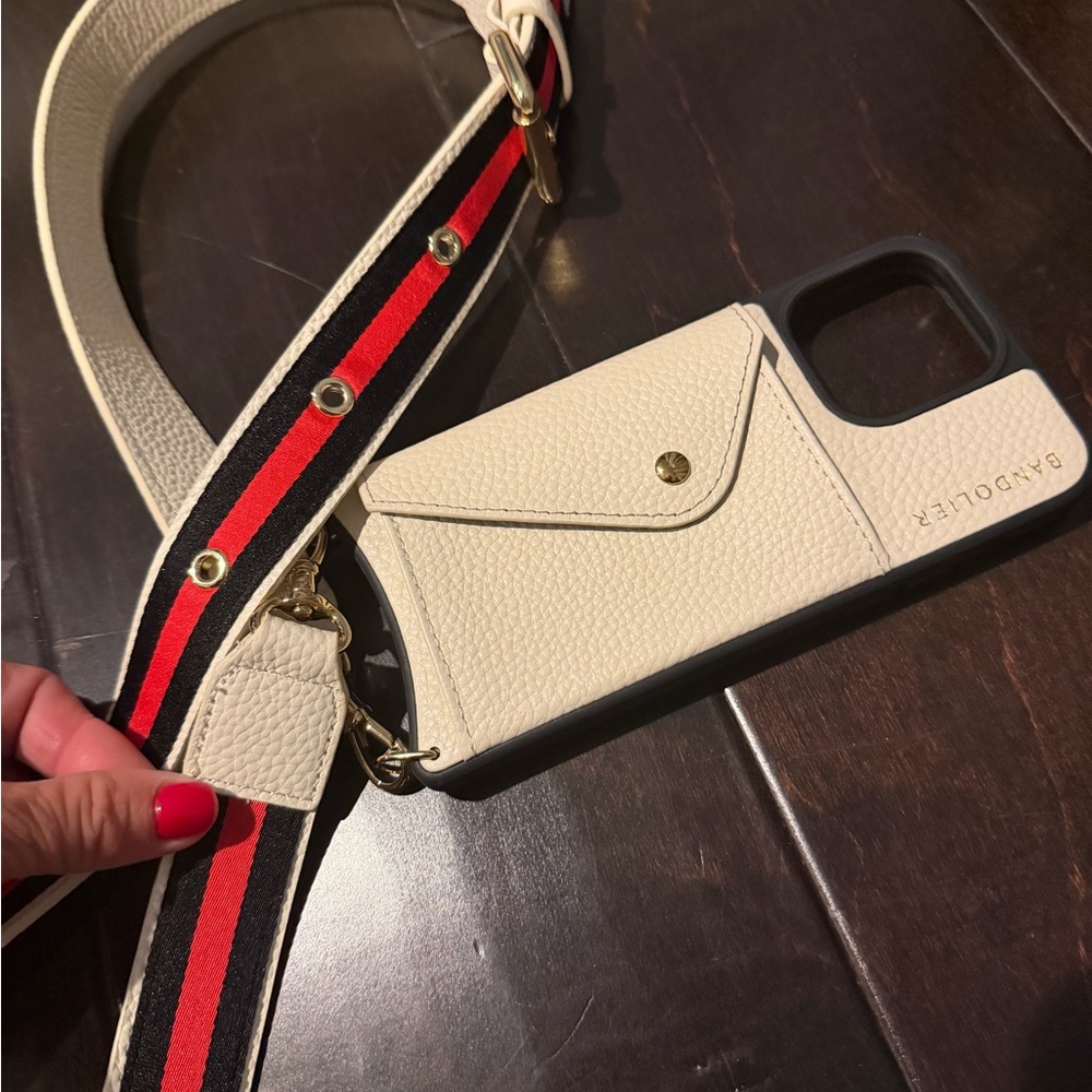 Bandolier Cream Phone Case with Red and Black Strap